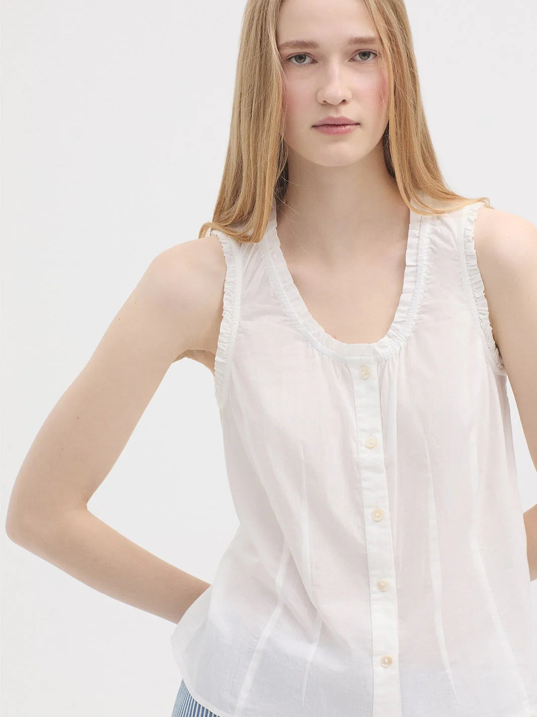 Ruffled White Sleeveless Shirt