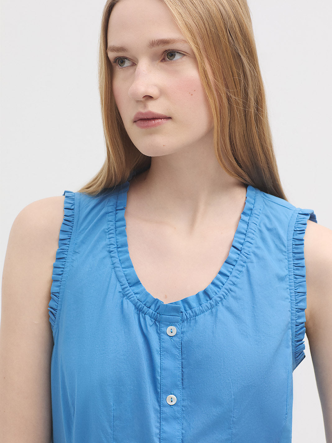 Ruffled Blue Sleeveless Shirt