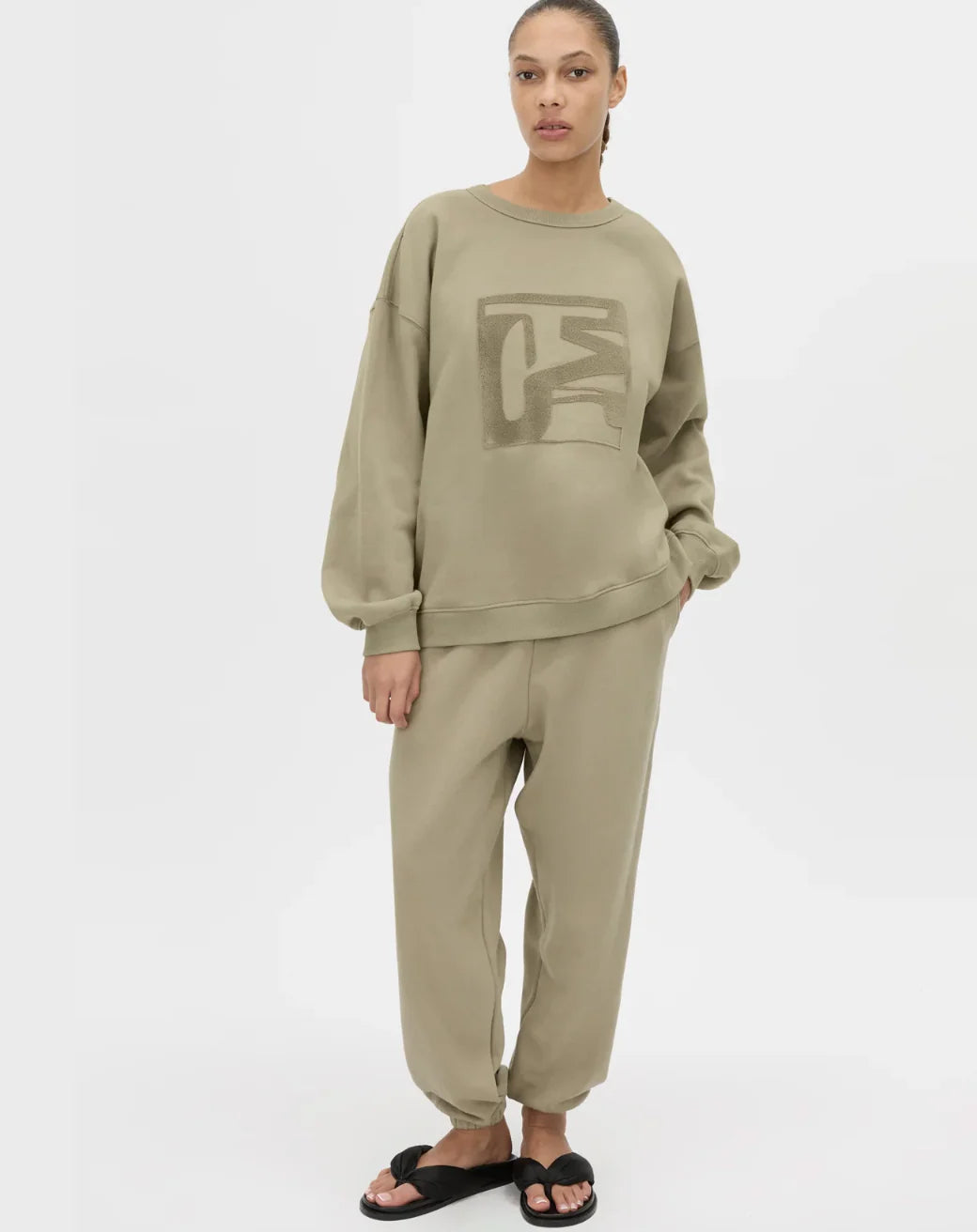 CAMILLA AND MARC Sonora Tracksuit Top in Clay with relaxed fit, flocked front artwork and brushed cotton interior.