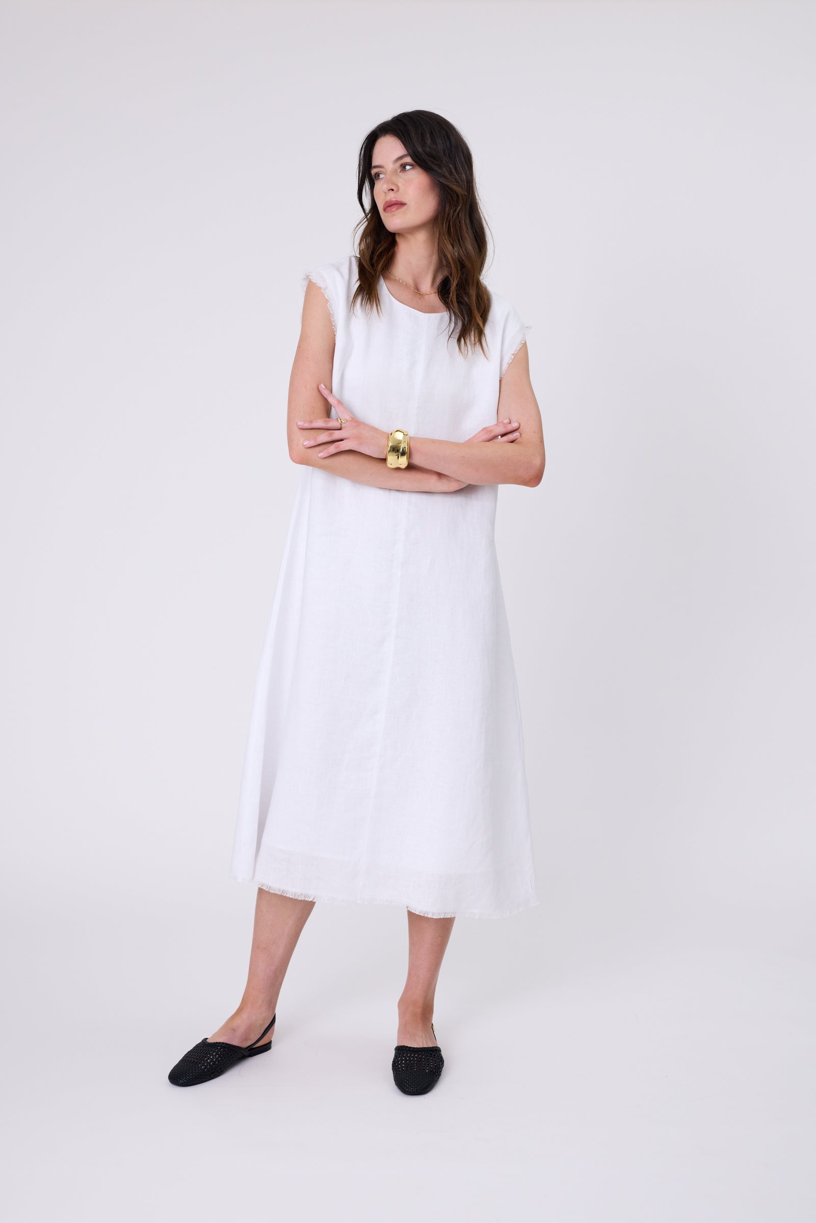 Costa Linen Dress in White — European linen A-line dress with frayed cap sleeves, keyhole back, and centre seam detail.